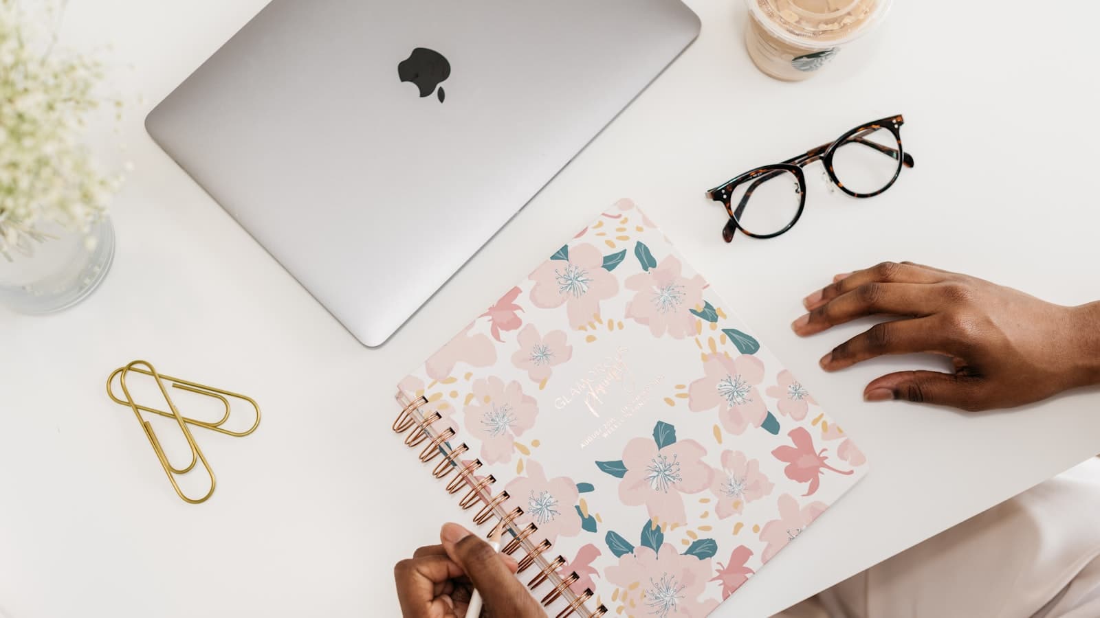 Couple using a smart wedding planning tool on their laptop