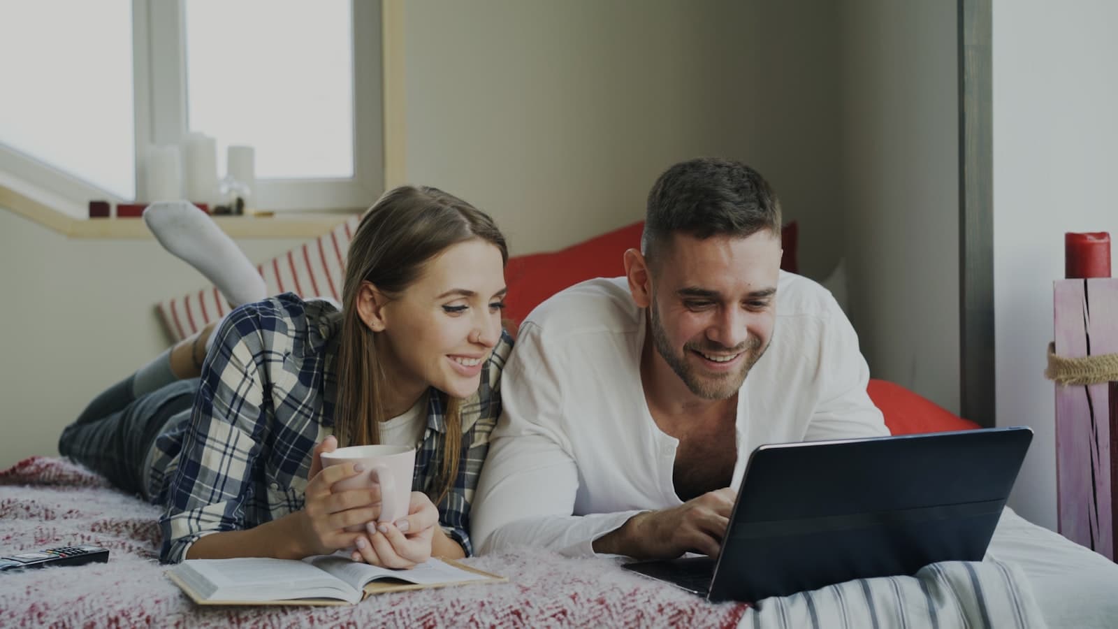 Couple, wedding planner, and parent reviewing wedding details together on a shared dashboard