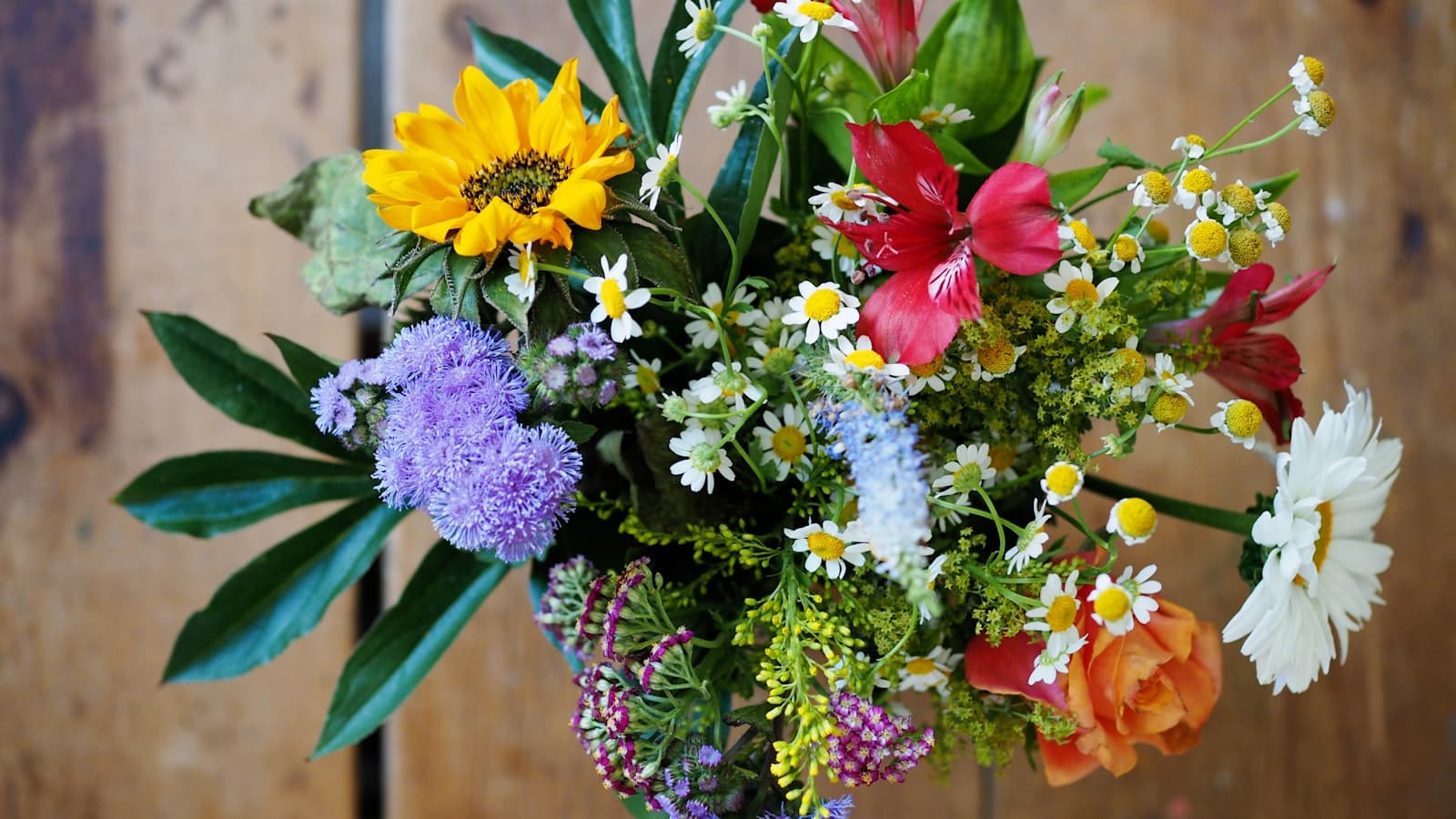 Couple meeting with a wedding vendor at a floral studio